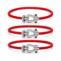 Diamond cable bracelet red cord stock image