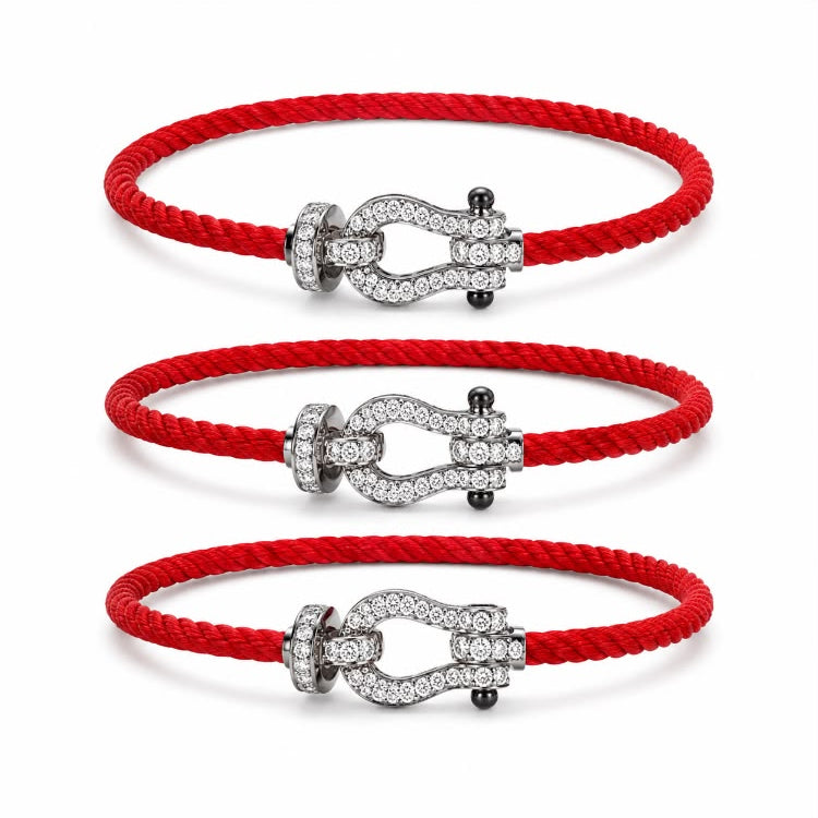 Diamond cable bracelet red cord stock image