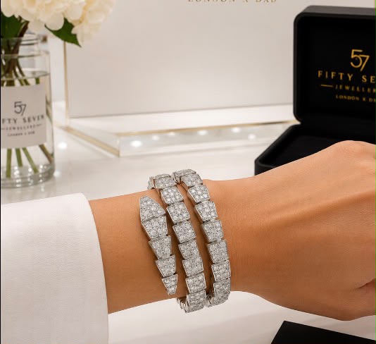 Full Pavé Diamond Serpent Wrap Bangle worn on wrist with 57 Jewellers box